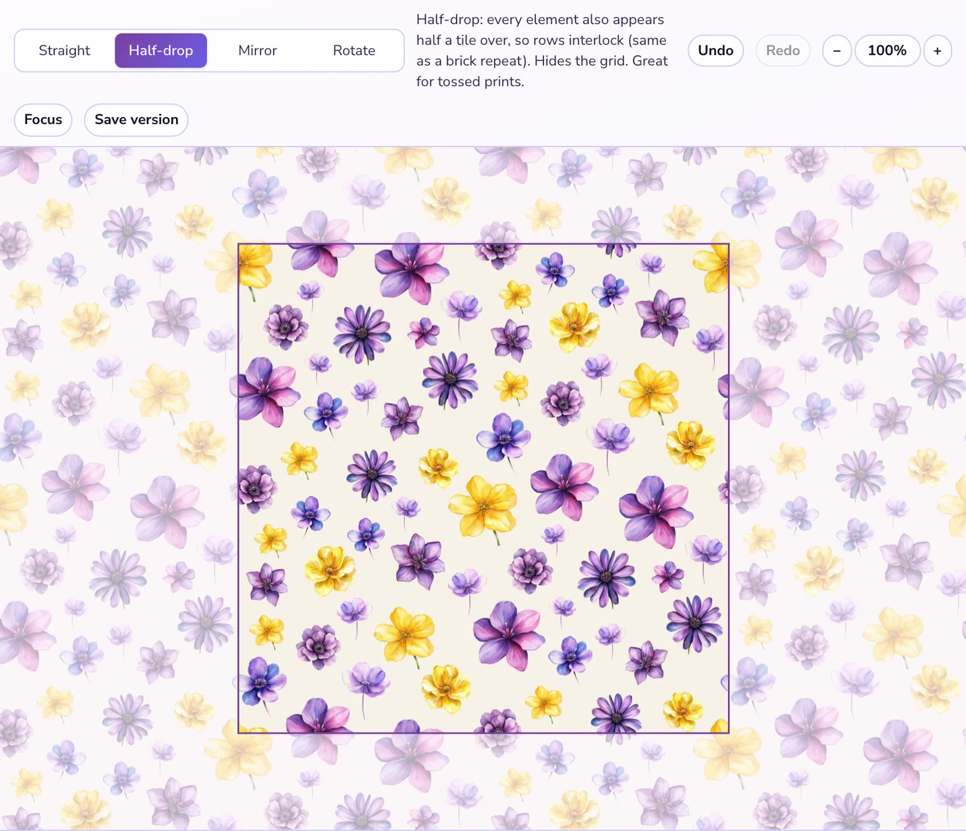 A half-drop flower pattern tile, with motifs crossing the edges and wrapping into the faded neighboring tiles